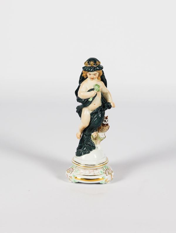 Small polychrome Meissen porcelain sculpture &quot;Putto with owl&quot;