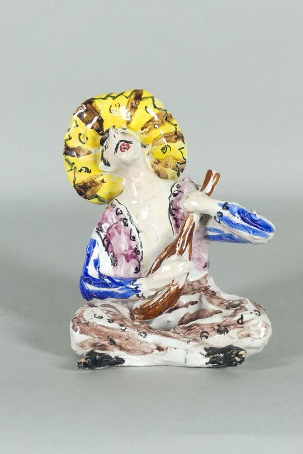 Scultura in maiolica smaltata di Vietri &quot;Messicano con mandola&quot;