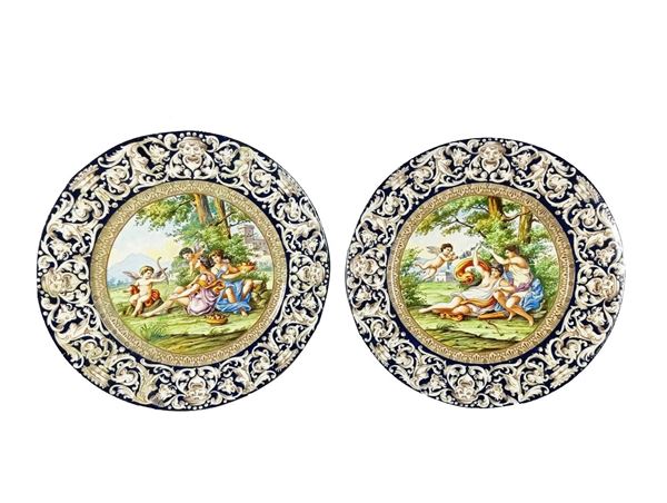 Pair of parade plates &quot;Mythological Allegories&quot; in Capodimonte glazed majolica