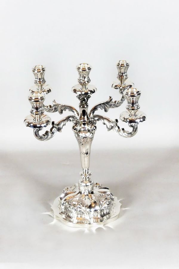 Candelabra in embossed silver, five flames. Gr. 1510