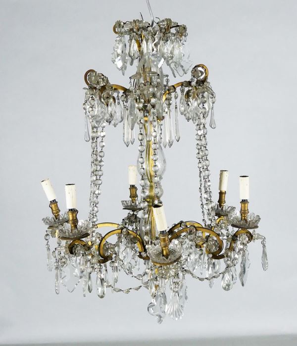 French chandelier of Louis XVI line in crystal and patinated bronze