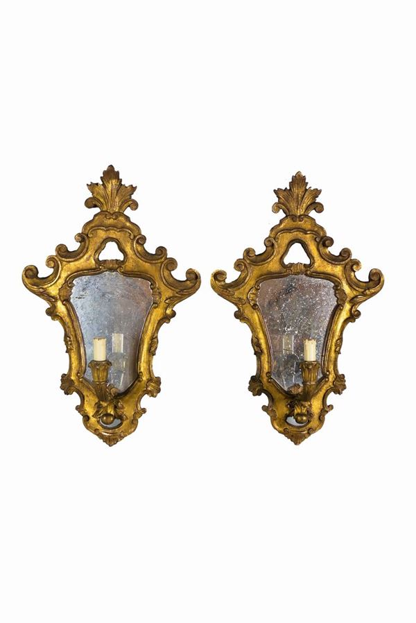 Pair of small Louis XV line mirrors in gilded wood