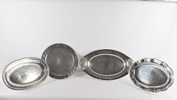 Four metal serving trays