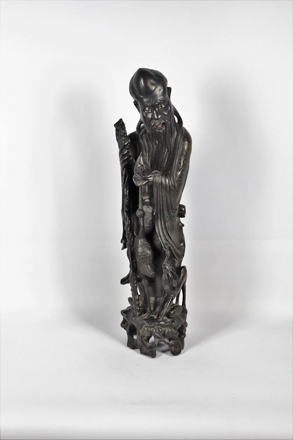 Chinese sculpture &quot;Santone con heron&quot; in ebonized wood
