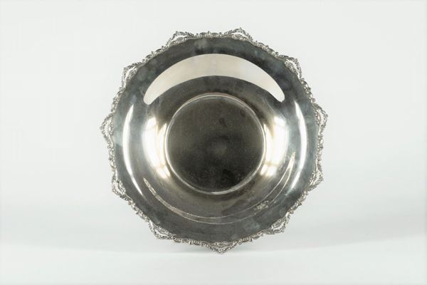 Round fruit bowl in silver metal