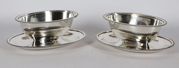 Coppia di salsiere ovali in argento gr 830