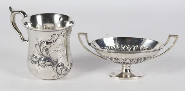 A mouthpiece and an oval salt in silver gr 140