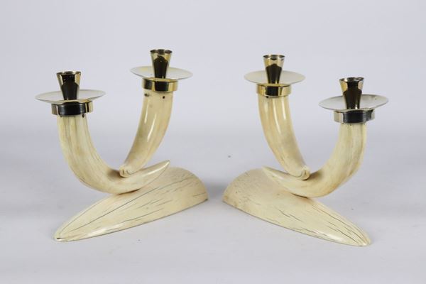 Pair of small silver and horn candelabra