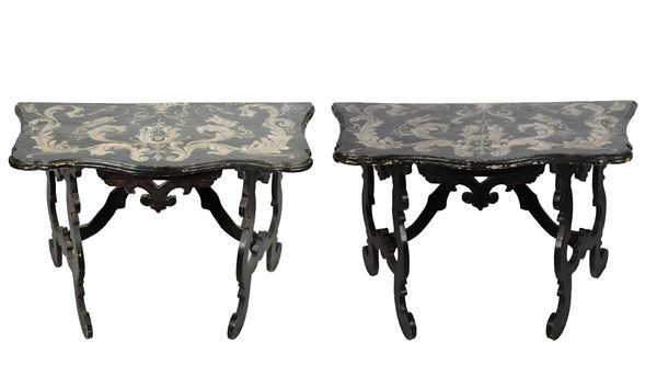Pair of antique Louis XIV line consoles in black lacquered wood