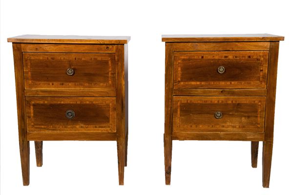 Pair of walnut bedside tables of the Louis XVI line