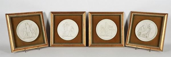 Four neoclassical medallions in white biscuit