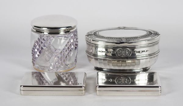 Lot of four boxes in silvered and chiseled metal