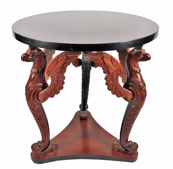 Round coffee table in mahogany