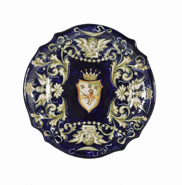 Small plate in glazed majolica from Pesaro signed Molaroni