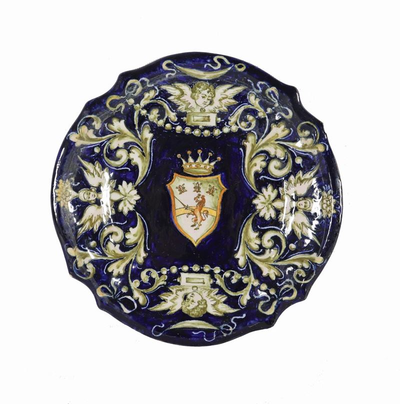 Piccolo piatto in maiolica lustrata di Pesaro firmato Molaroni