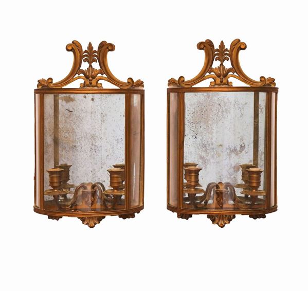 Pair of half-round wall lanterns in gilded bronze