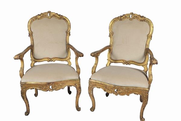 Pair of Louis XV armchairs in gilded wood
