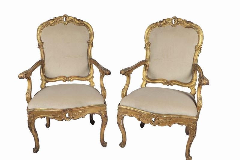 Coppia di poltrone Luigi XV in legno dorato