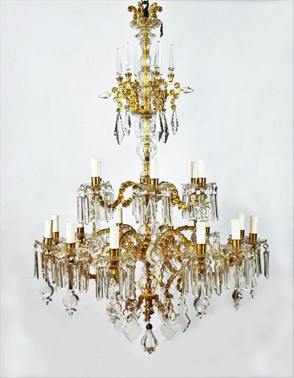 French chandelier of the Louis XV line in crystal and gilded metal