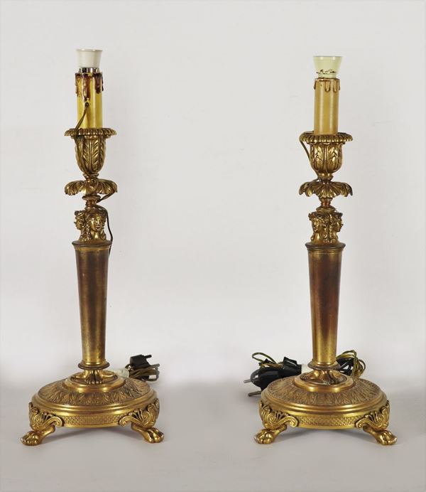 Pair of French candlesticks in gilded bronze