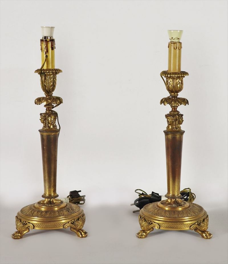 Coppia di candelieri francesi in bronzo dorato