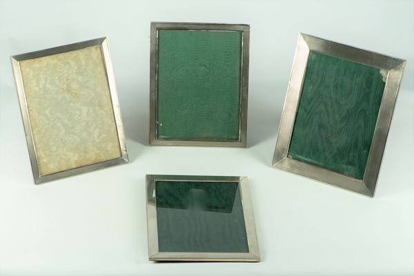 Four silver picture frames