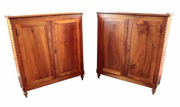 Pair of Louis Philippe Tuscan sideboards in walnut with two doors