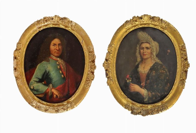 "Nobiluomo e nobildonna" coppia di dipinti ovali ad olio su tela