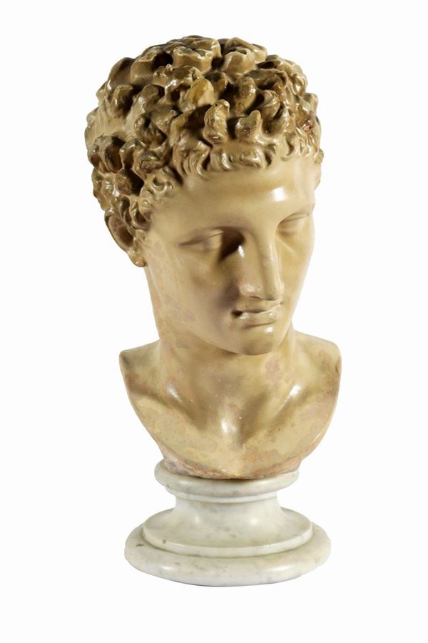 Patinated plaster bust "Apollo"