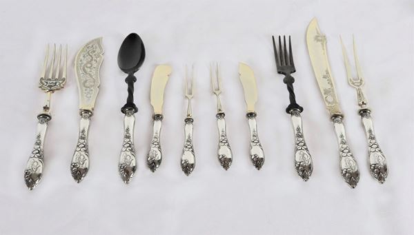 Lot of ten antique serving cutlery with silver handles gr. 50