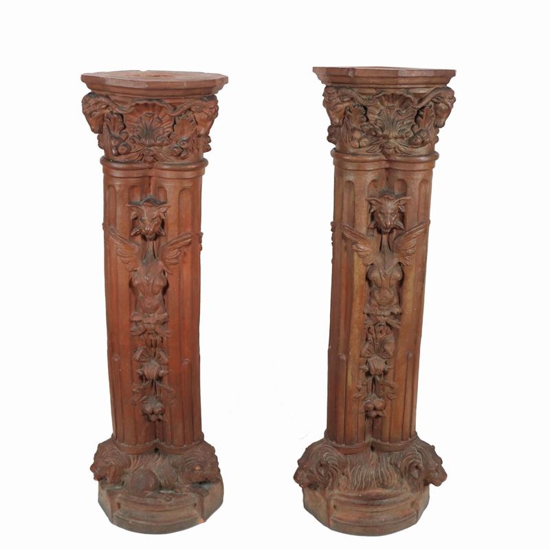 Coppia di colonne Liberty in terracotta