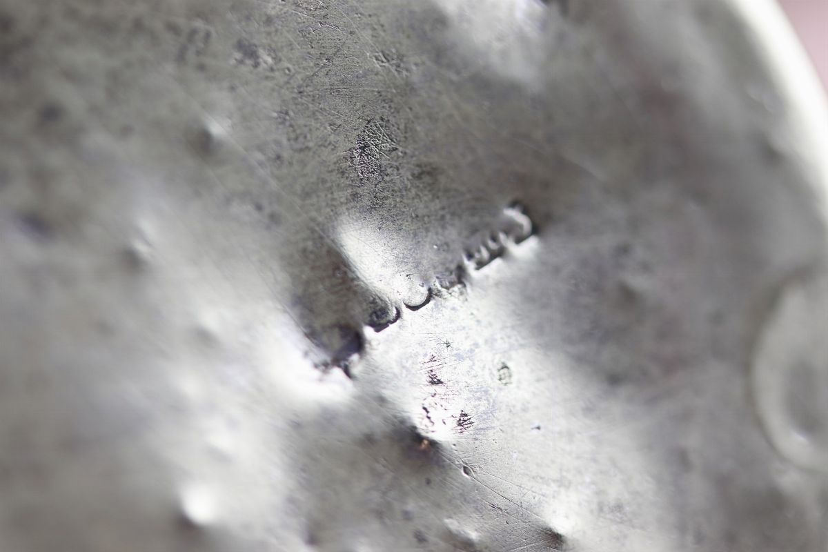 Lotto in argento e metallo (2 pz)