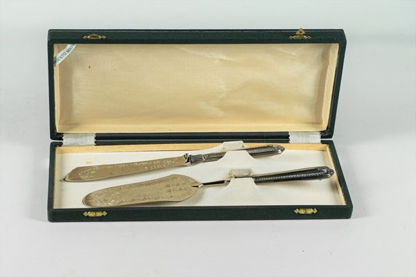 Pair of dessert cutlery with silver handles