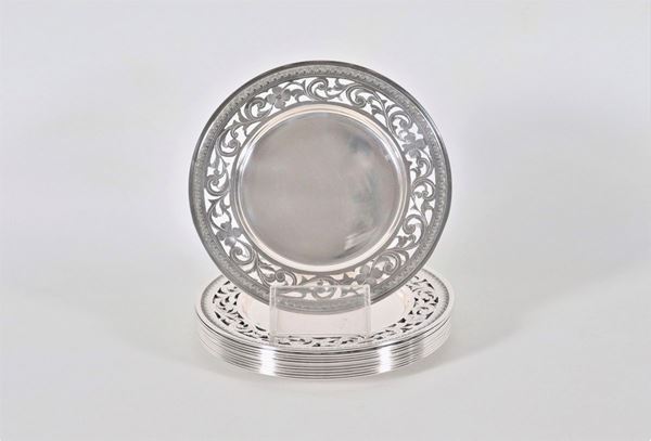 Lotto di dodici piattini in argento gr. 1700