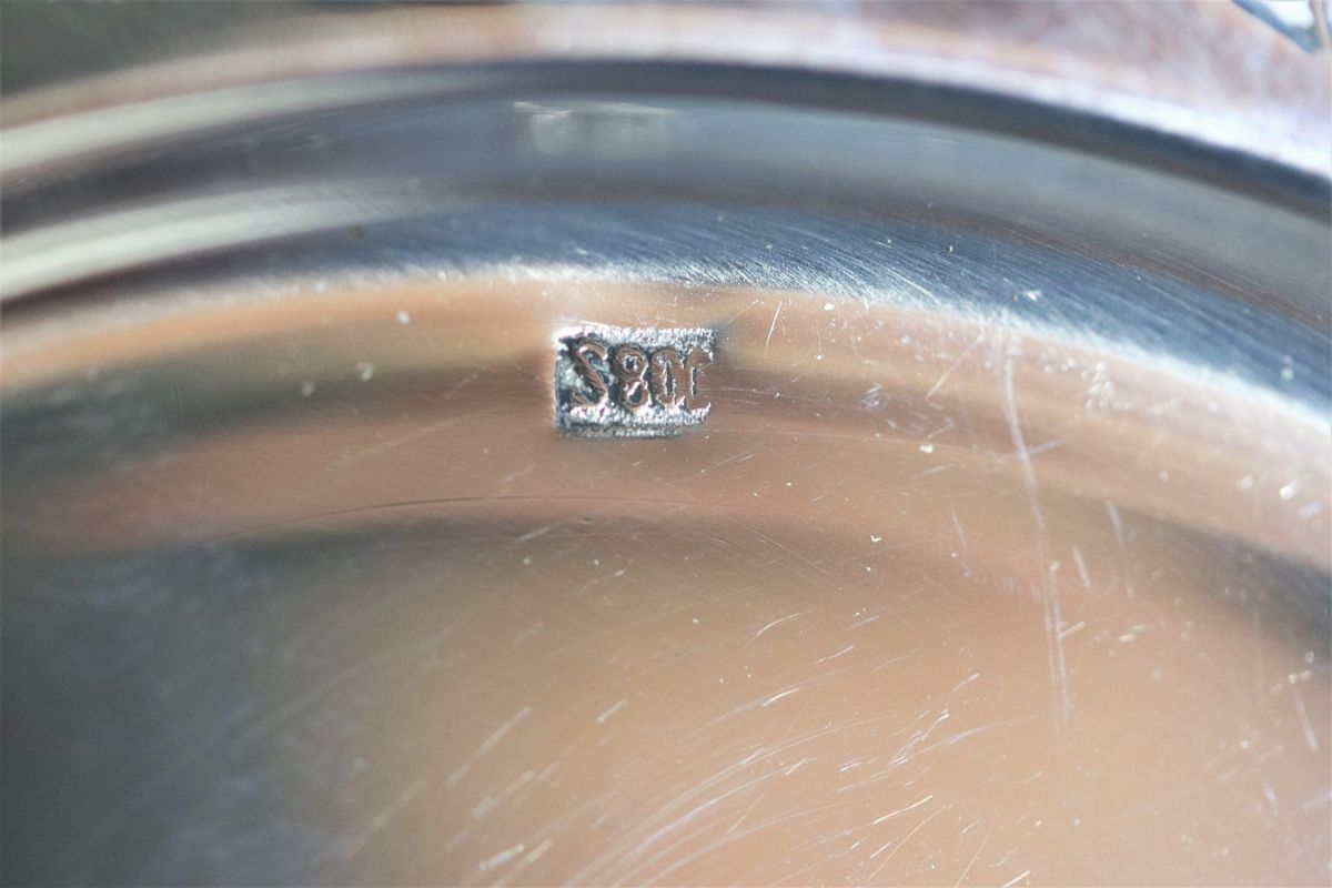 Lotto di dodici piattini in argento gr. 1700