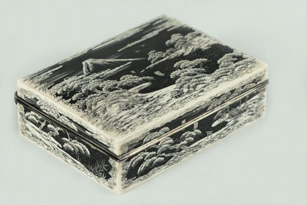 Ivory box decorated with oriental landscape motifs