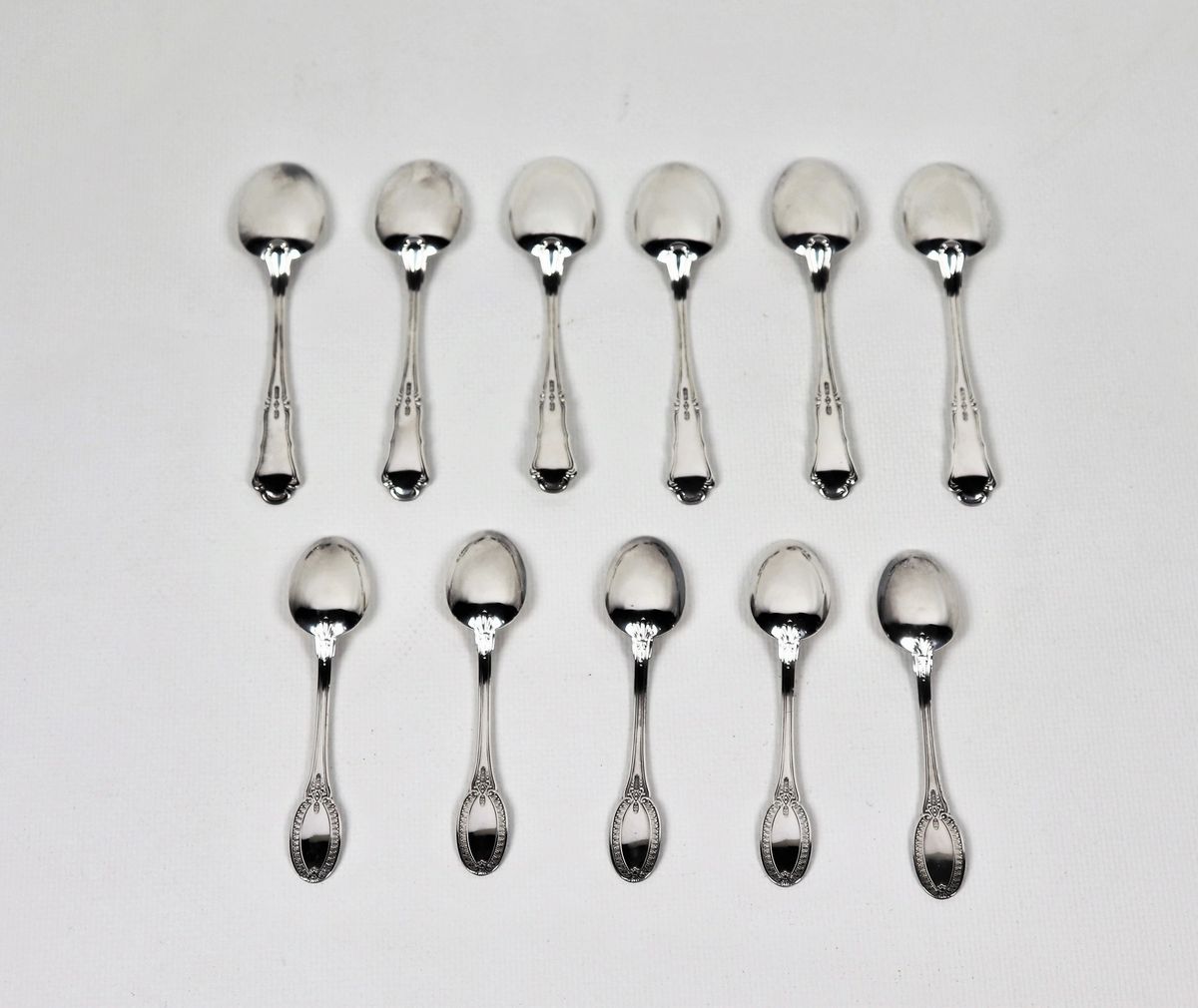 Lotto di undici cucchiaini da caffè in argento gr. 120
