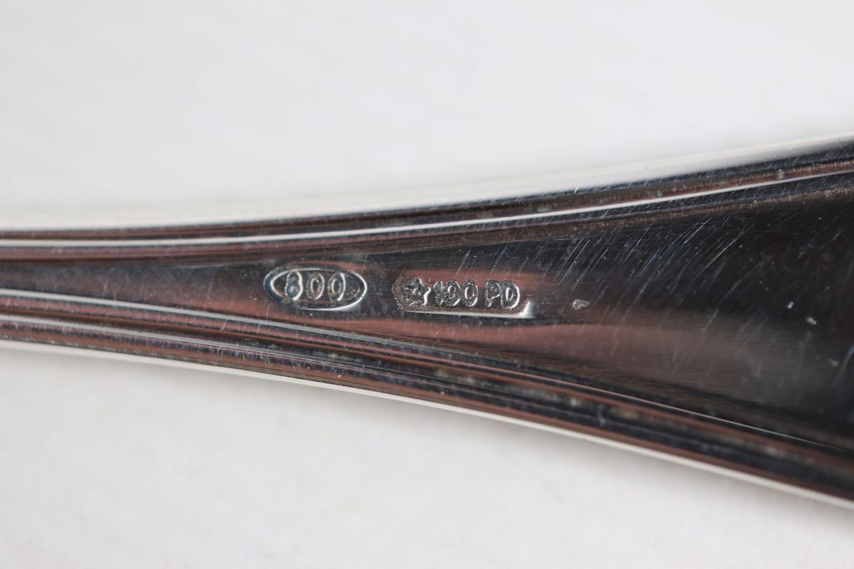 Lotto di dodici cucchiaini in argento cesellato gr. 138