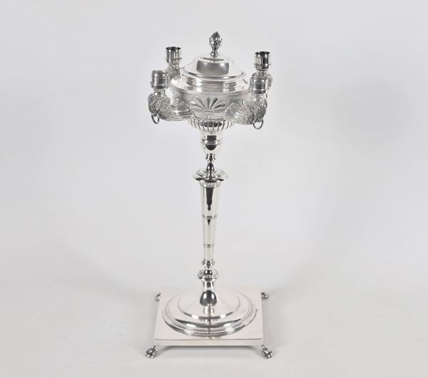 Roman candelabra in silver in the shape of a lamp