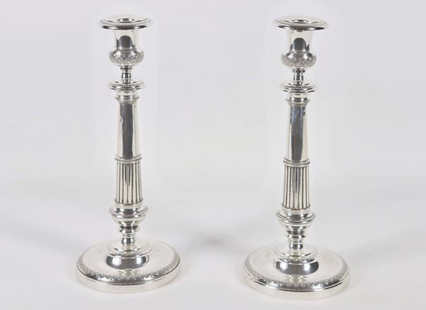 Coppia di candelieri in argento gr. 530