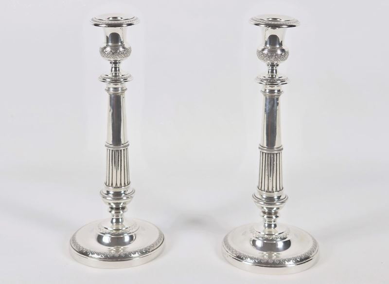 Coppia di candelieri in argento gr. 530