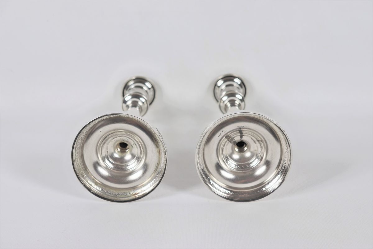 Coppia di candelieri in argento gr. 530