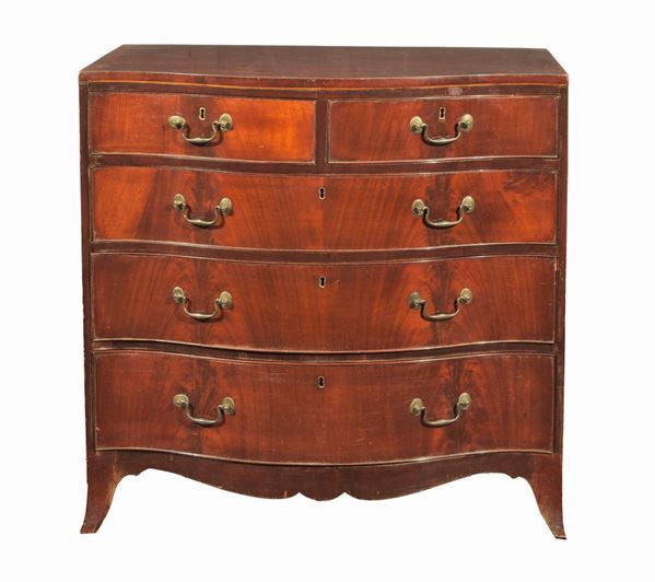 Antique mahogany chest of drawers with a rounded arched shape