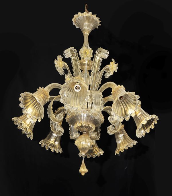 Transparent Murano blown glass chandelier with golden highlights