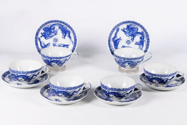 Six porcelain teacups with saucers