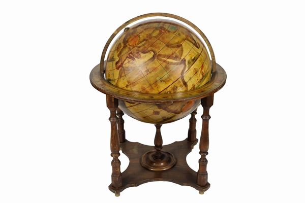Terrestrial globe in decorated and colorful wood