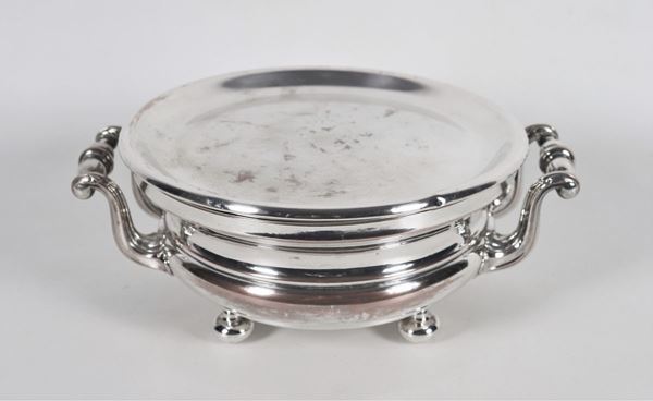 Antique chafing dish in embossed silver metal with two handles and four feet