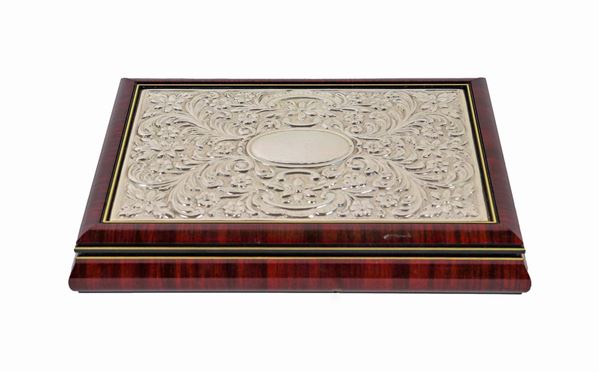 Rectangular shaped walnut card box with lid covered in chiseled and embossed silver