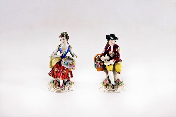 Pair of Capodimonte polychrome porcelain figurines "Contadinelli"