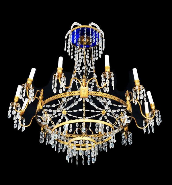 French chandelier in golden metal and crystal of the Empire line with 12 lights